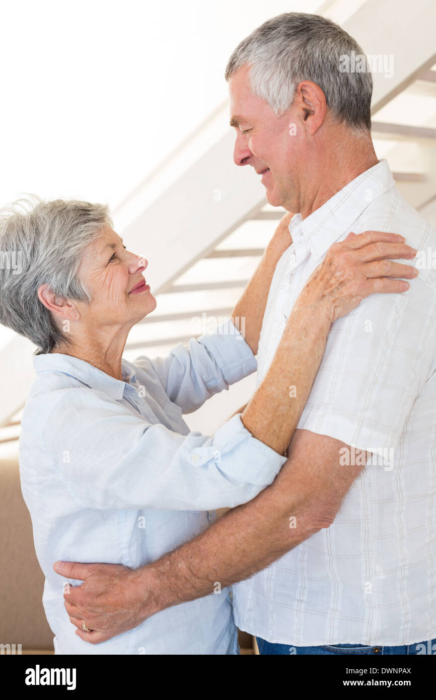 Affectionate senior couple dancing together Stock Photo