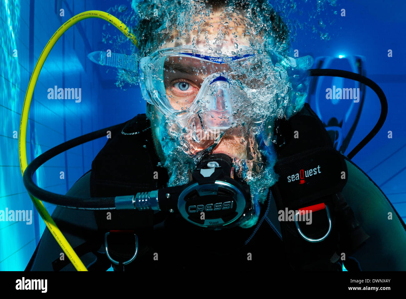 Scuba diver with air bubbles, portrait, in a swimming pool, Nuremberg, Bavaria, Germany Stock Photo