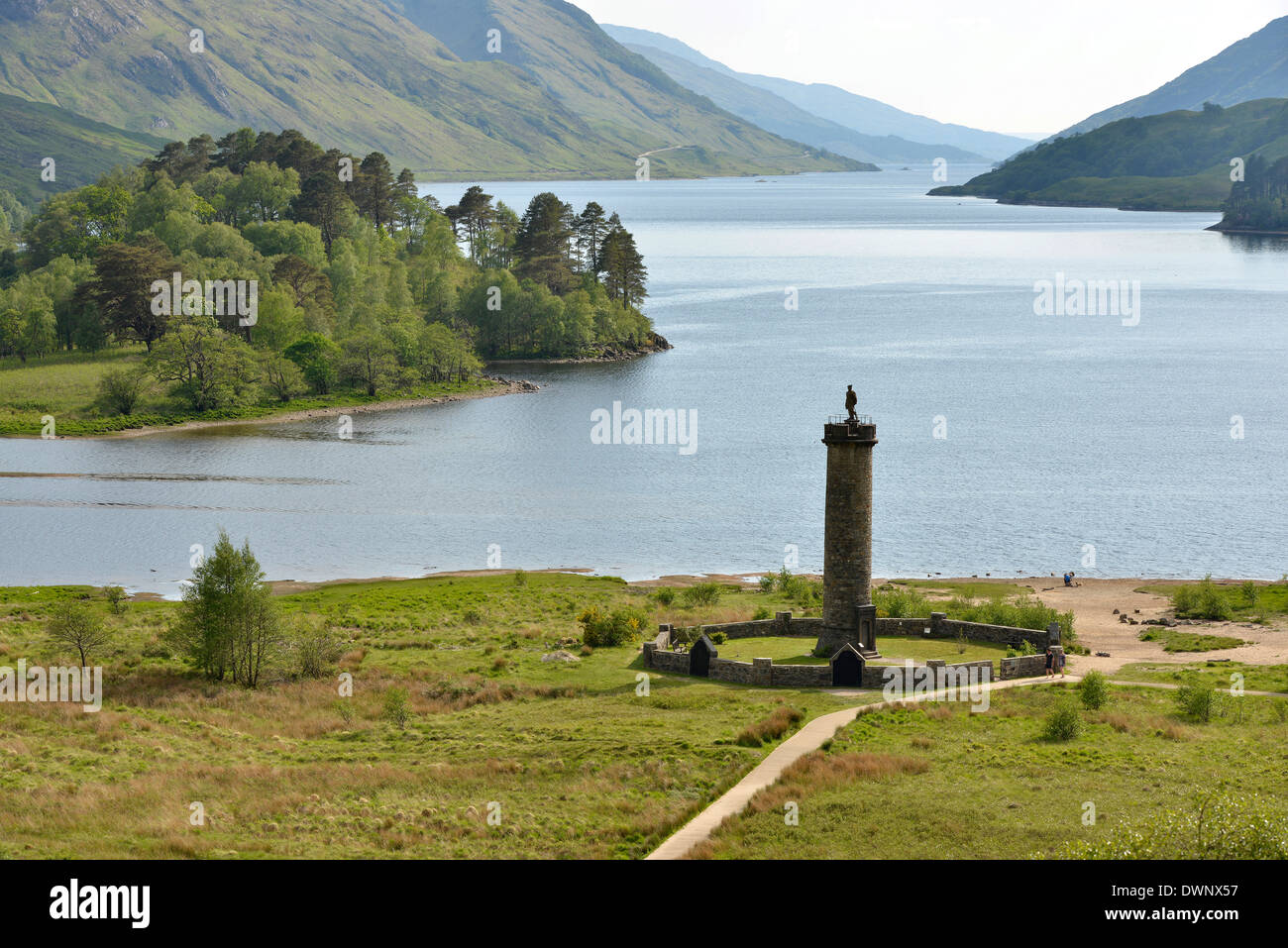 Monument at Glenfinnan commemorating the Jacobite Rising, on the shore ...