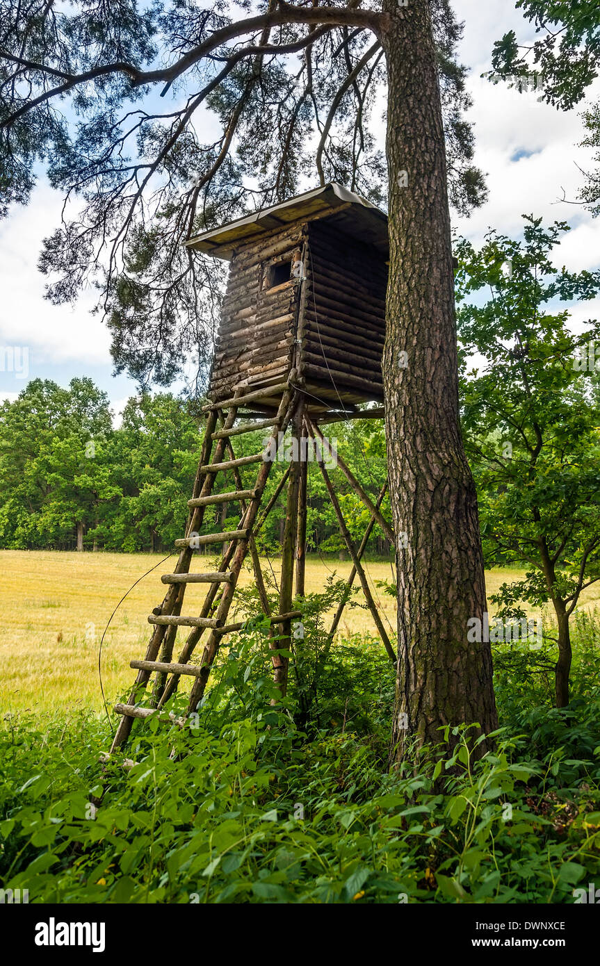 Wooden observation hunter hut in Czech forest Stock Photo