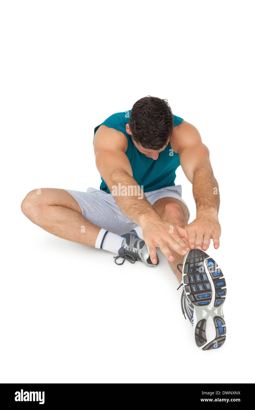 Young man exercising floor Cut Out Stock Images & Pictures - Alamy