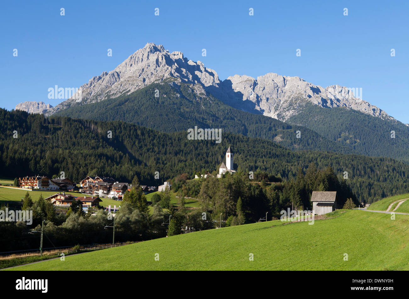 Townscape of Vierschach with the Parish Church of St. Magdalena, Puster Valley, Sexten Dolomites, South Tyrol, Italy Stock Photo