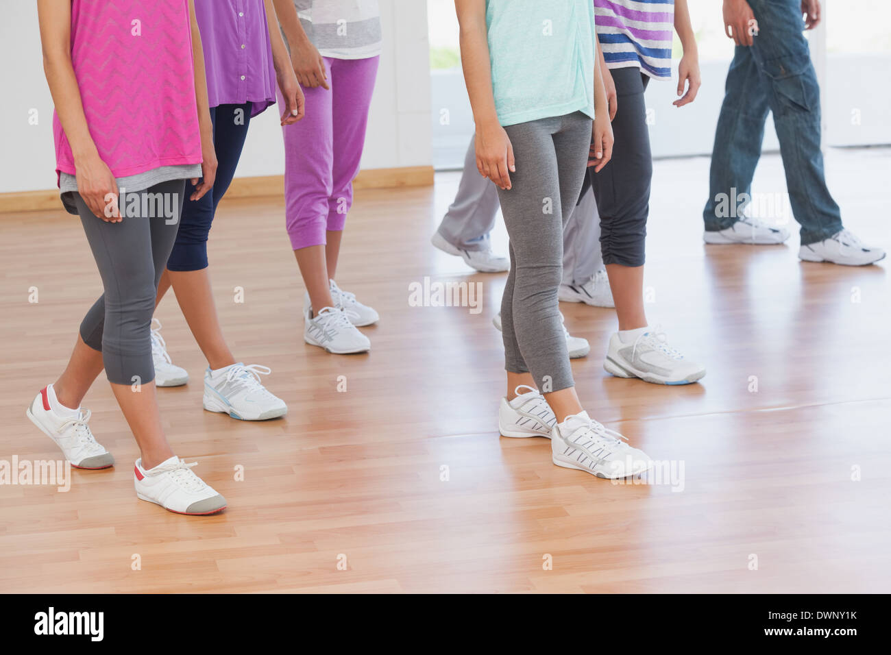 Low section of fitness class and instructor Stock Photo