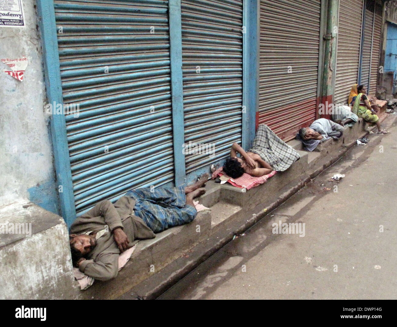 Streets of Kolkata, man sleeping on the streets of Kolkata,India on January 25, 2009. Stock Photo