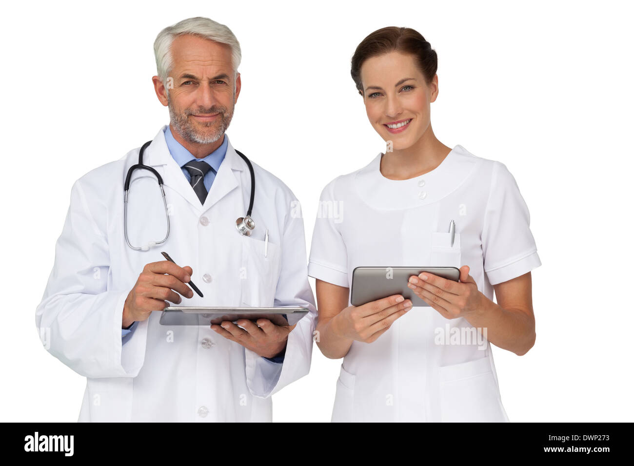 Male and female doctors with digital tablets Stock Photo Alamy