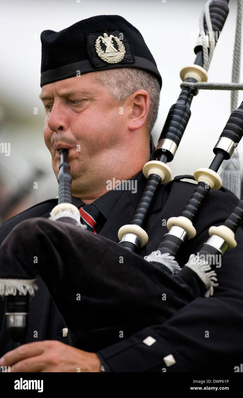 Piper at the Cowal Gathering. The Gathering is a traditional Highland Games held each year in Dunoon in Scotland Stock Photo