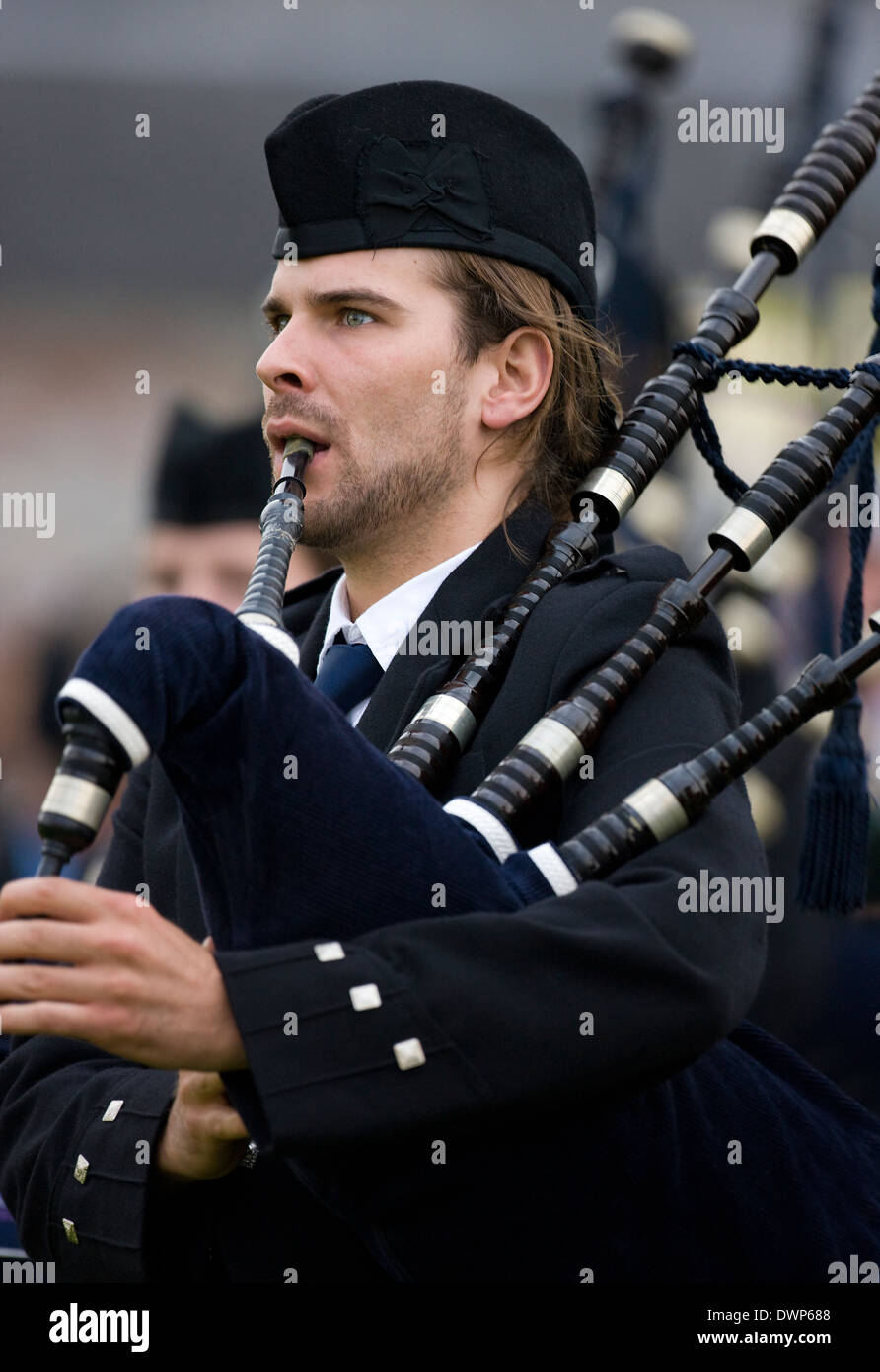 Piper at the Cowal Gathering - a traditional Highland Games near Dunoon on the Cowal Peninsula in Scotland Stock Photo
