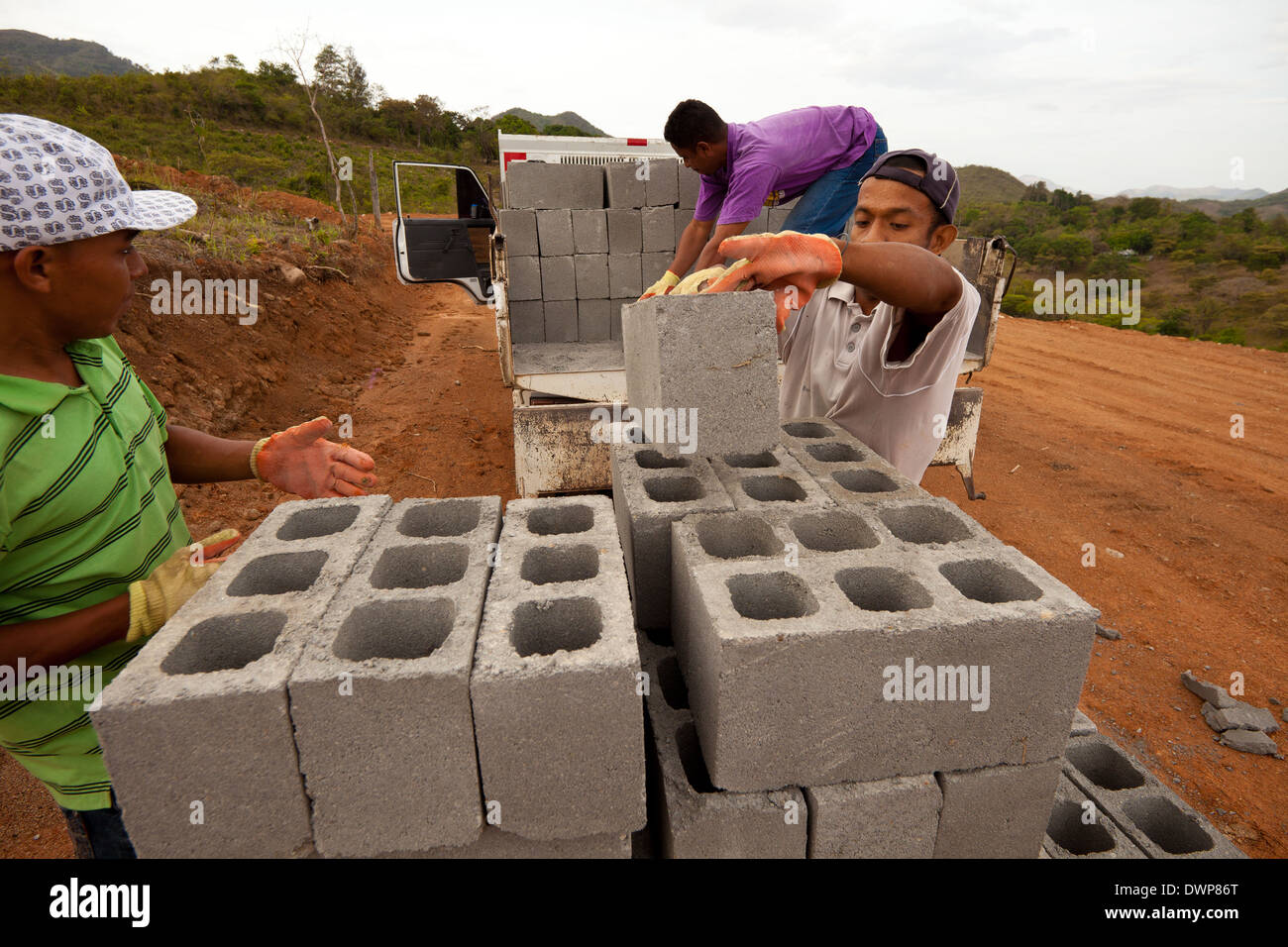 Workers deliver concrete blocks to a client near La Pintada, Cocle