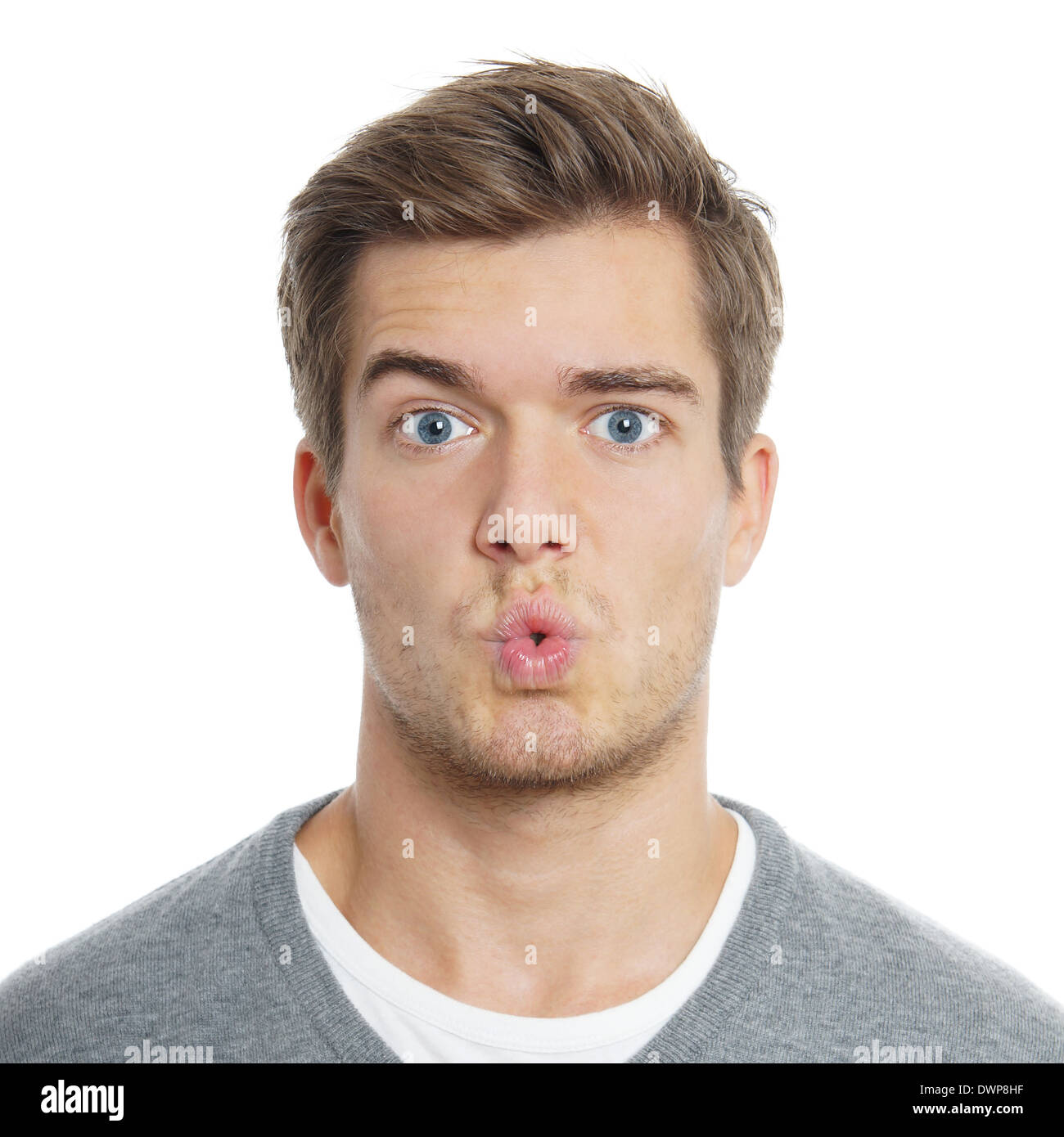 surpised young man with funny facial expression Stock Photo
