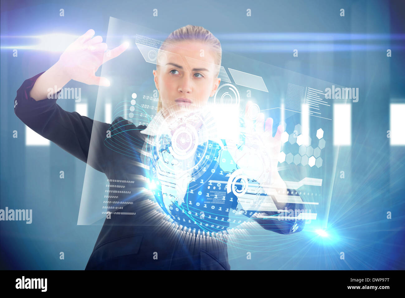 Blonde businesswoman touching interface with earth Stock Photo