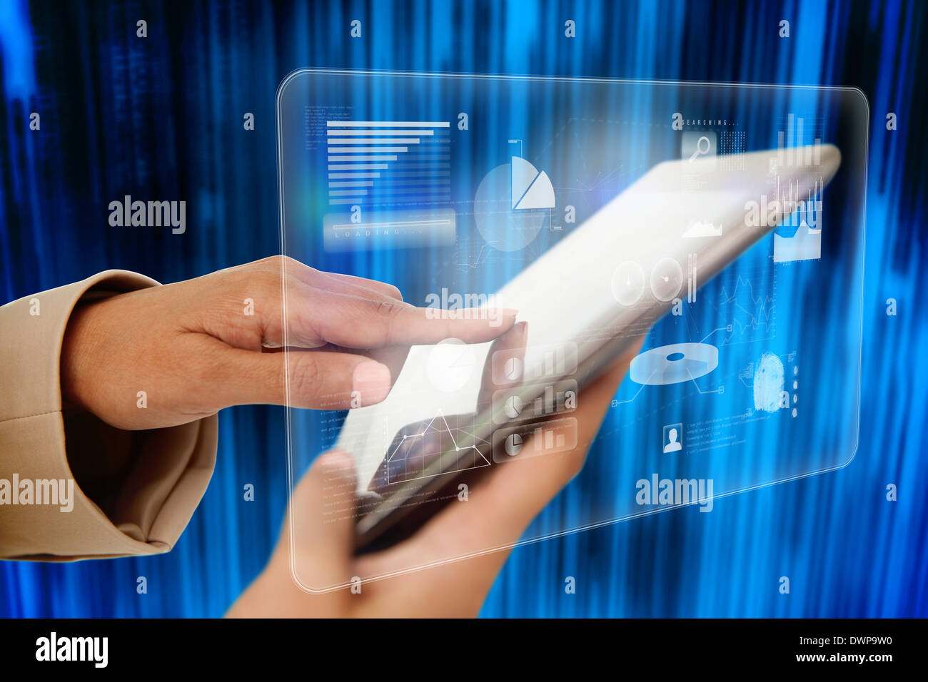 Businesswoman touching tablet with interface Stock Photo