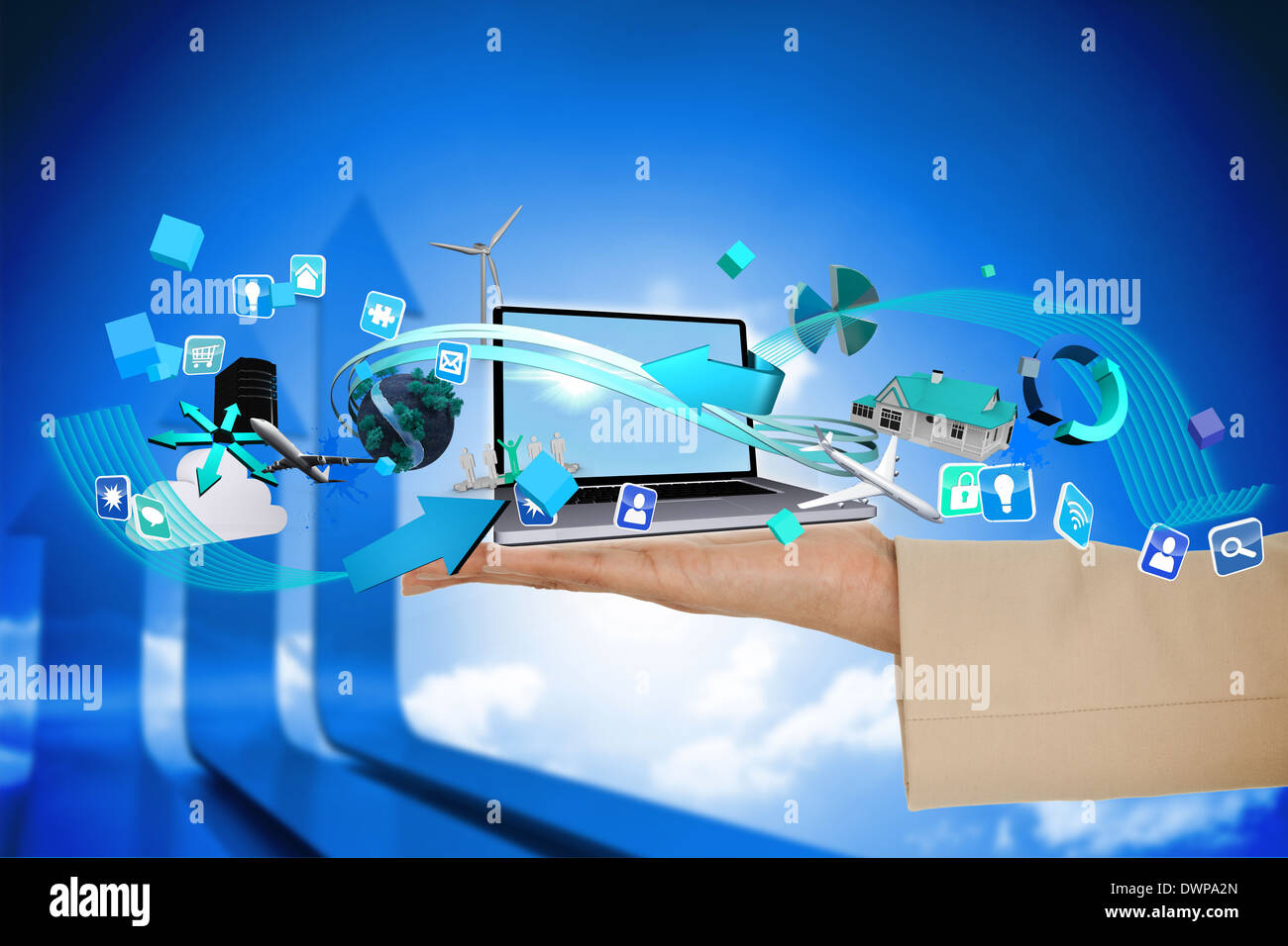 Hand presenting laptop and app icons Stock Photo