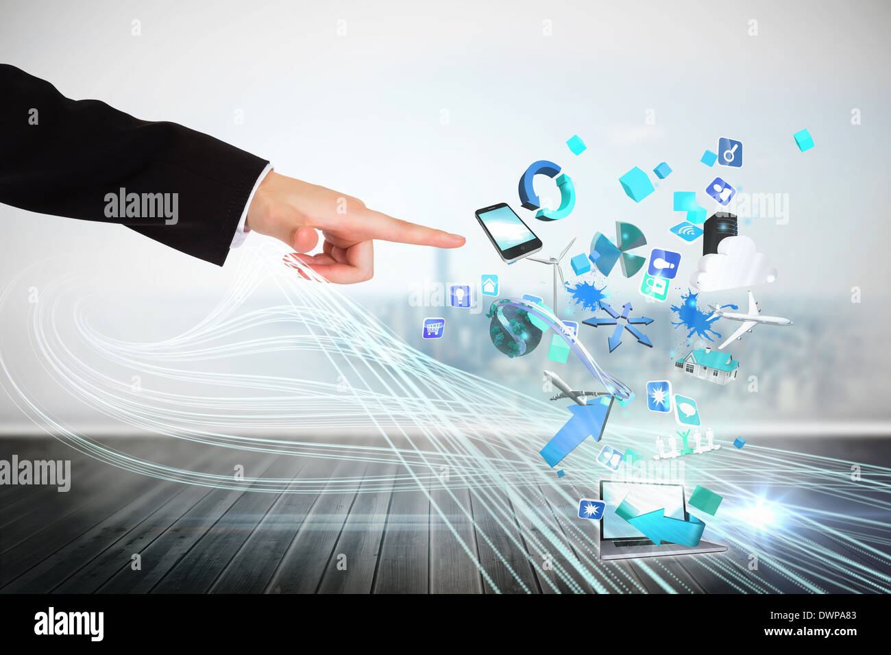 Finger pointing to app icons with laptop Stock Photo