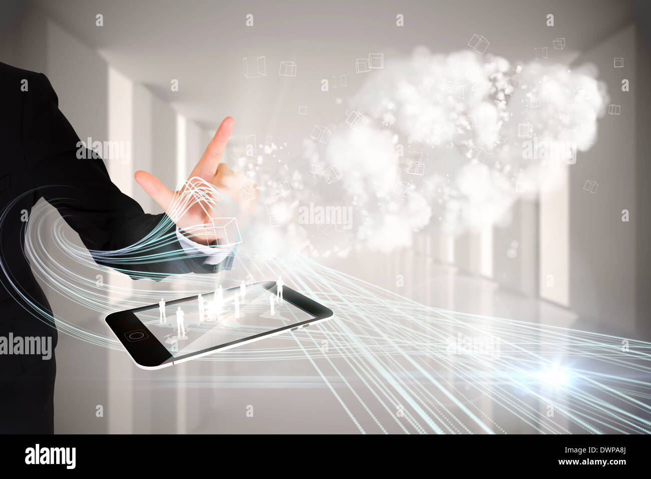 Finger pointing to clouds with tablet pc Stock Photo