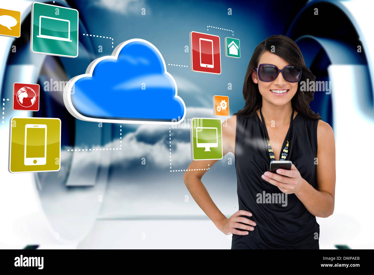 Glamorous brunette using smartphone with cloud and icons Stock Photo