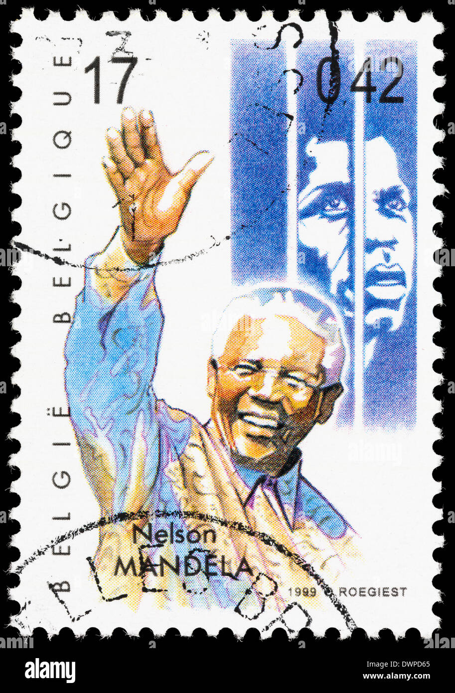 Belgium postage stamp with  illustrations of Nelson Mandela (younger, behind prison bars, and older, after being freed). Stock Photo
