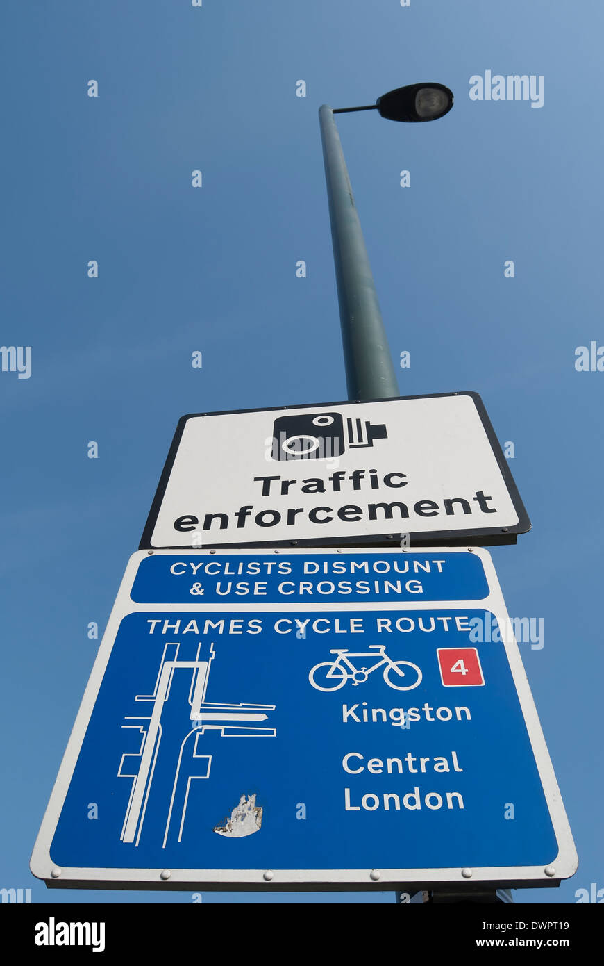 british road signs for traffic enforcement cameras and thames cycle routes to kingston and central london Stock Photo