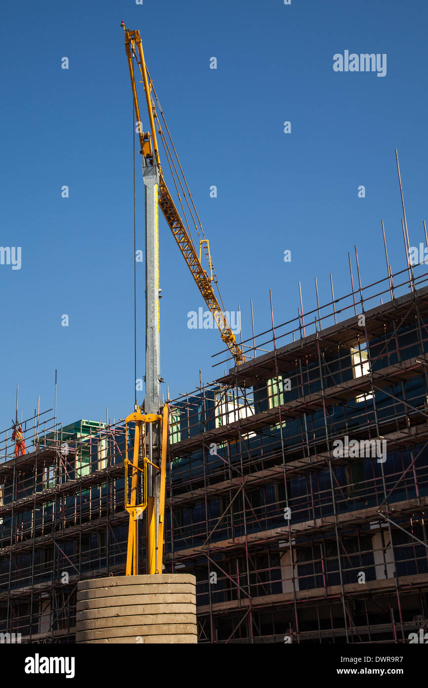 Manchester, UK 12th March, 2014. Steel erectors working on the City