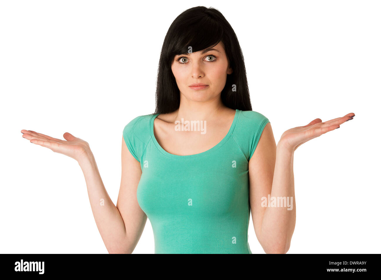 Doubtful uncertain woman isolated over white background Stock Photo