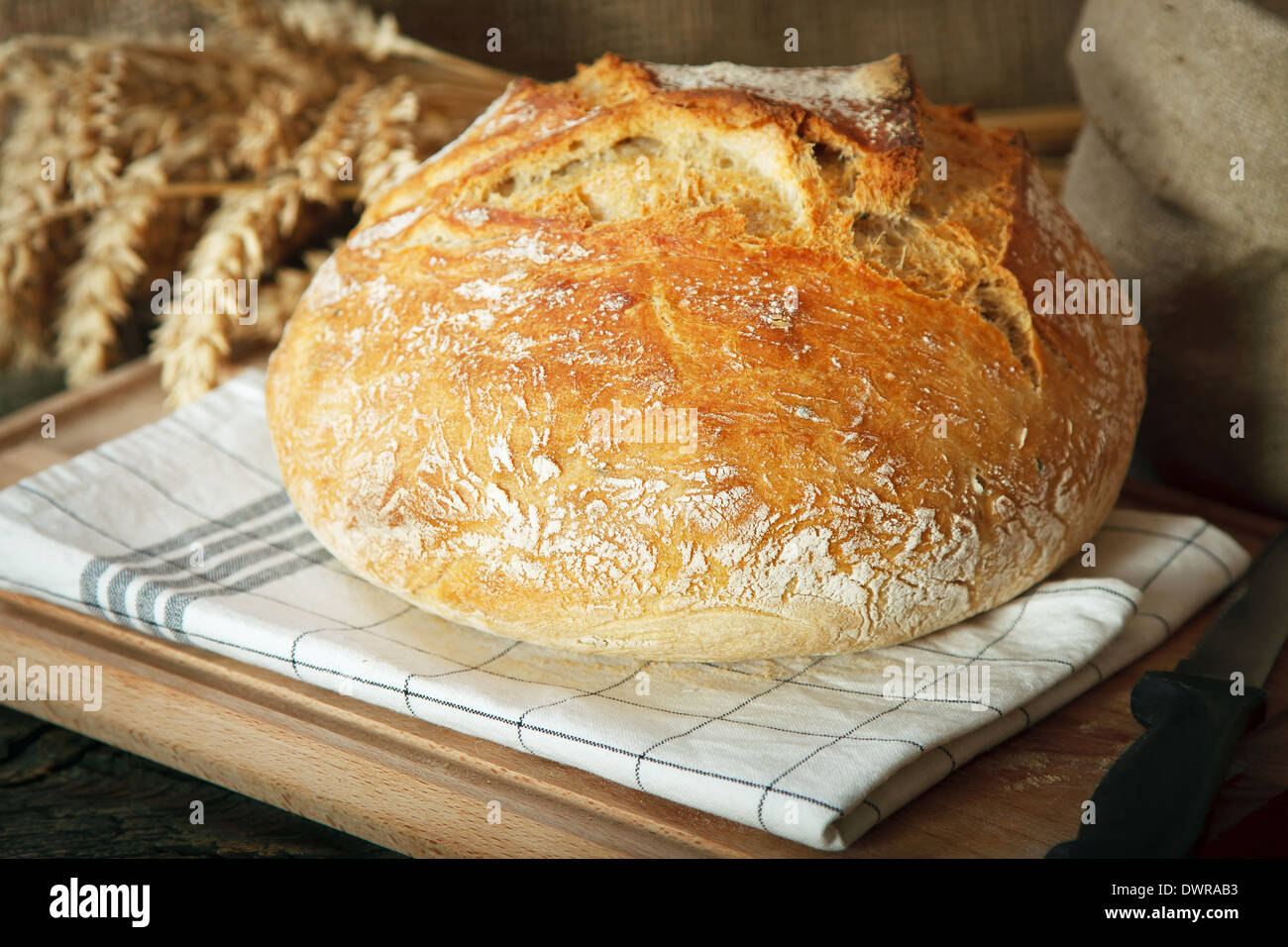 Home made bread on wooden table Stock Photo