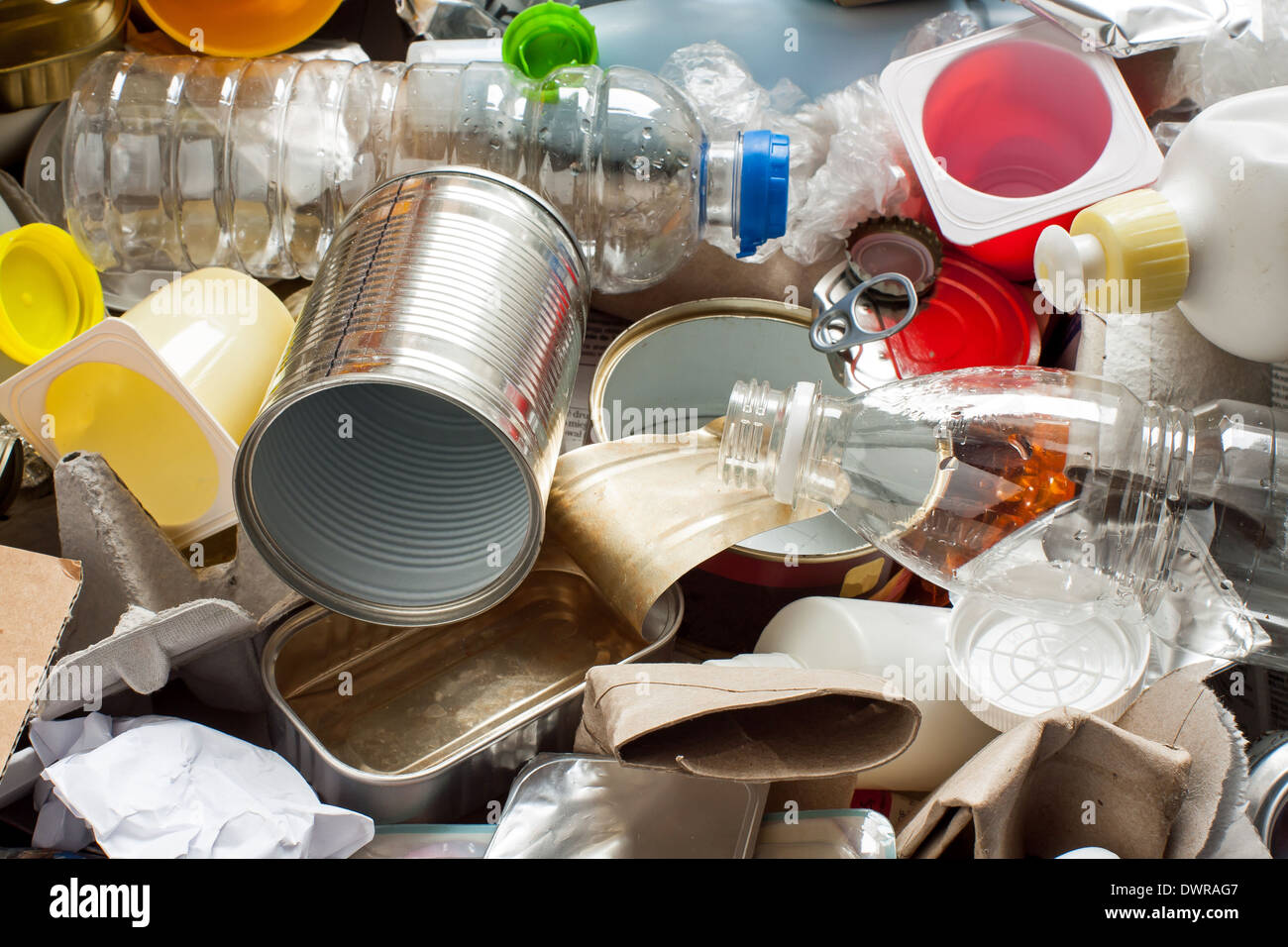 Recycling garbage and reusable waste management as metal, plastic, old paper products to be reused Stock Photo