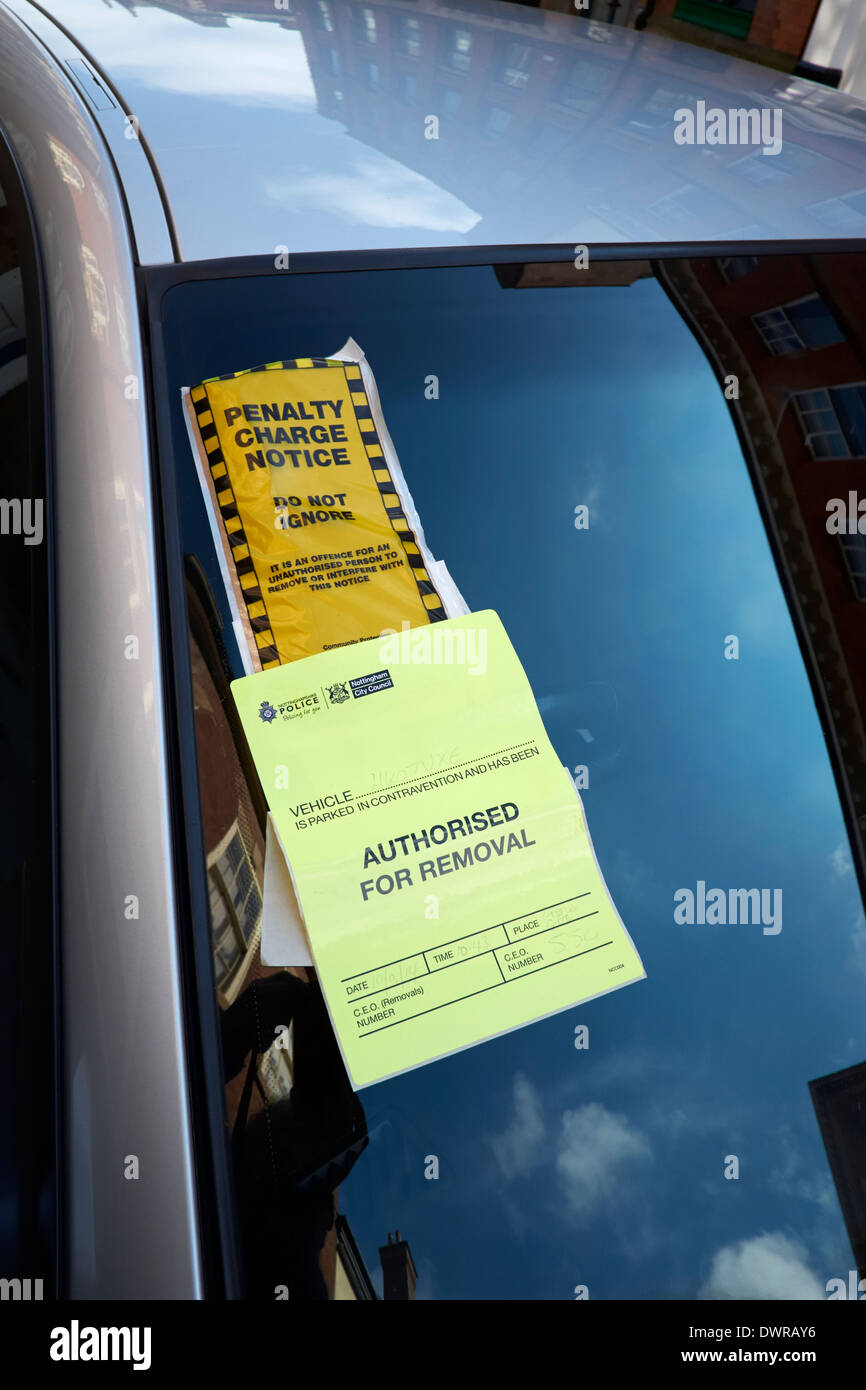 Penalty charge notice and authorised for removal sticker Nottingham England UK Stock Photo