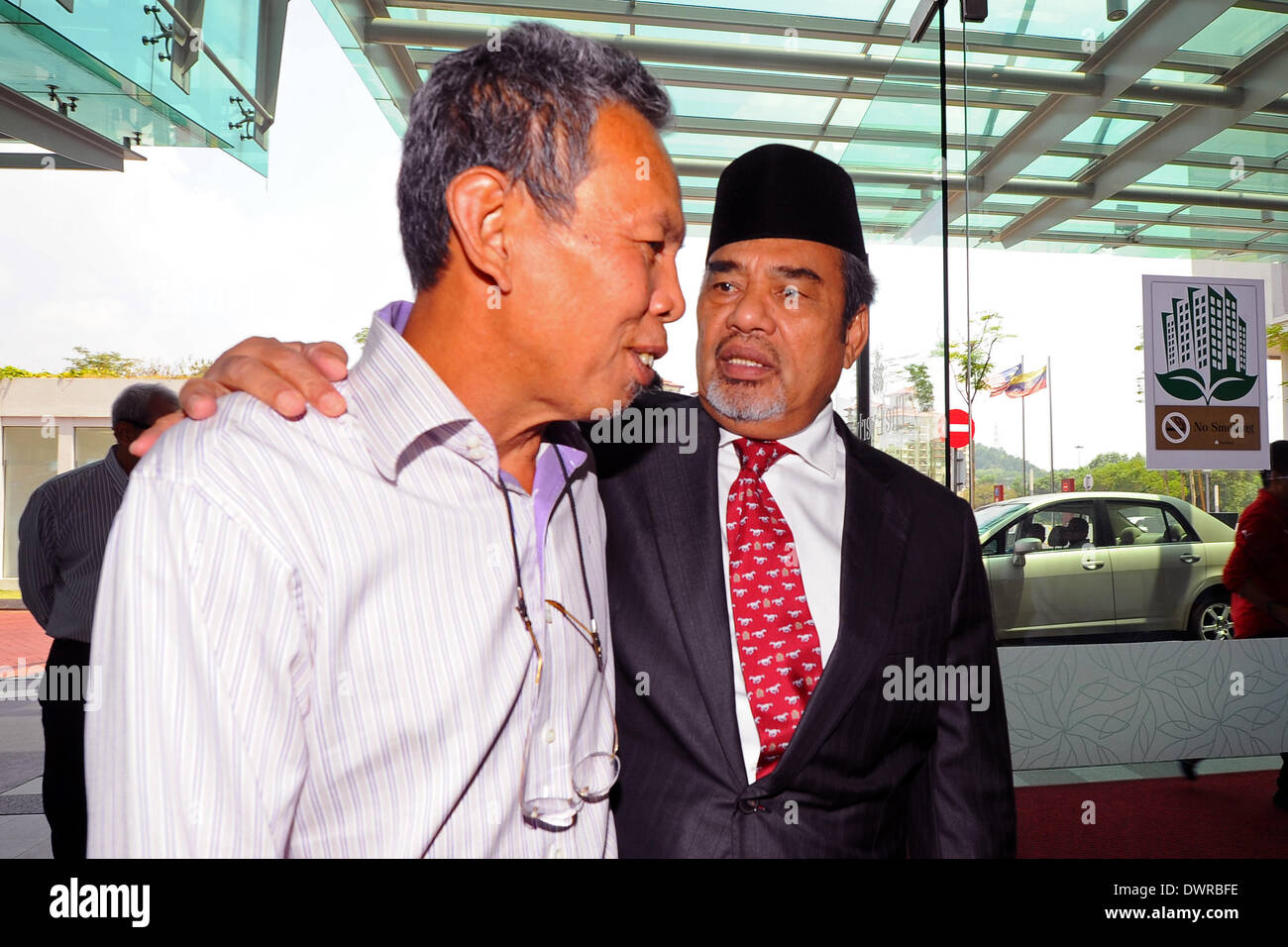 Putrajaya Mys 12th Mar 2014 Deputy Minister Of Agriculture Datuk Tajuddin Abu Rahman Embraces Osman Selamat 60 Years Old Father Of A Passenger On Board The Malaysia Airline Missing Flight Mh370 At