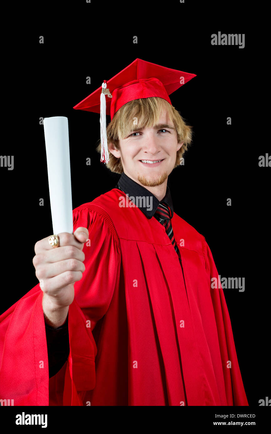 School boy wearing graduation cap hires stock photography and images