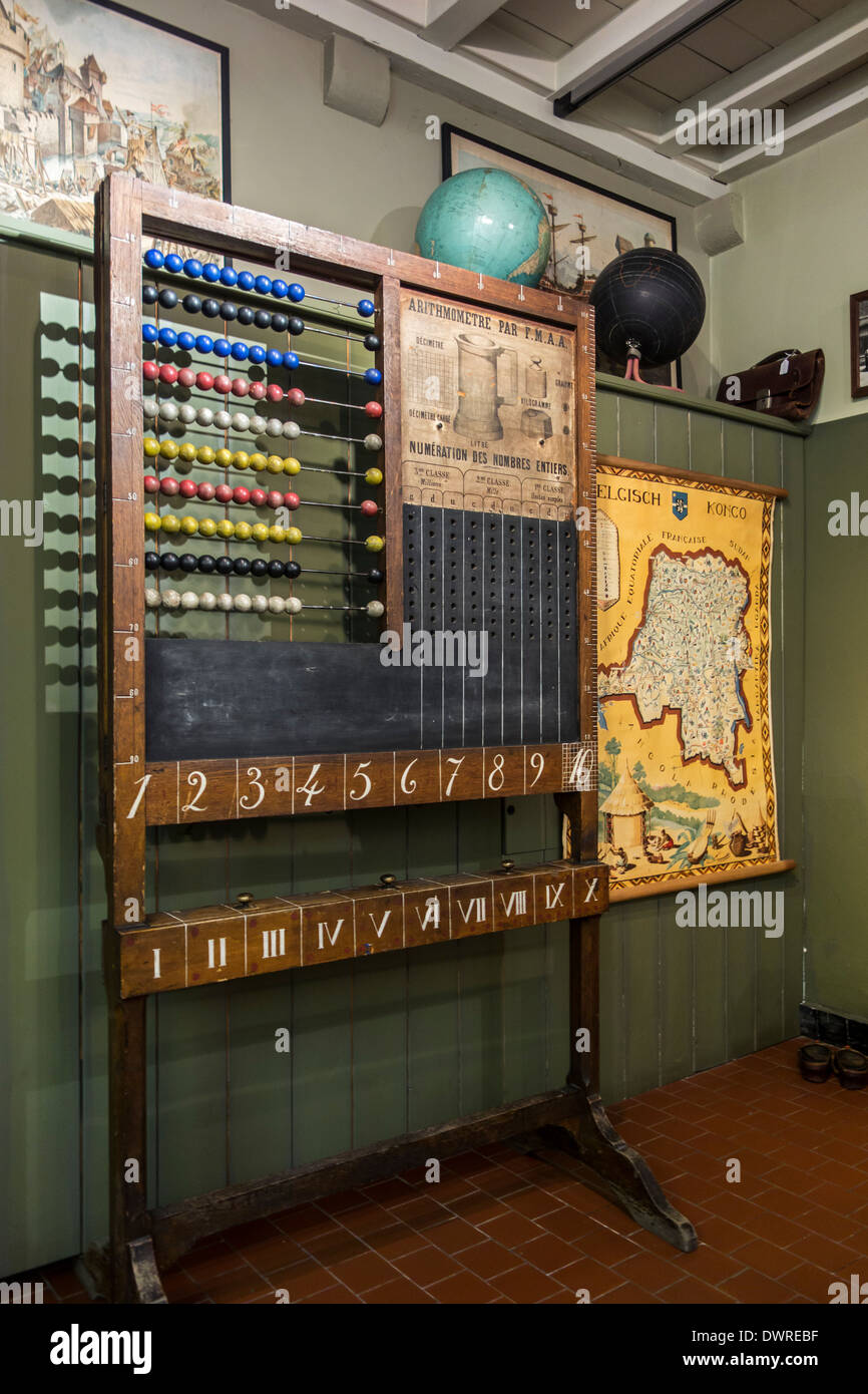 Old school blackboard with counting frame in classroom of the early twentieth century, House of Alijn museum, Ghent, Belgium Stock Photo