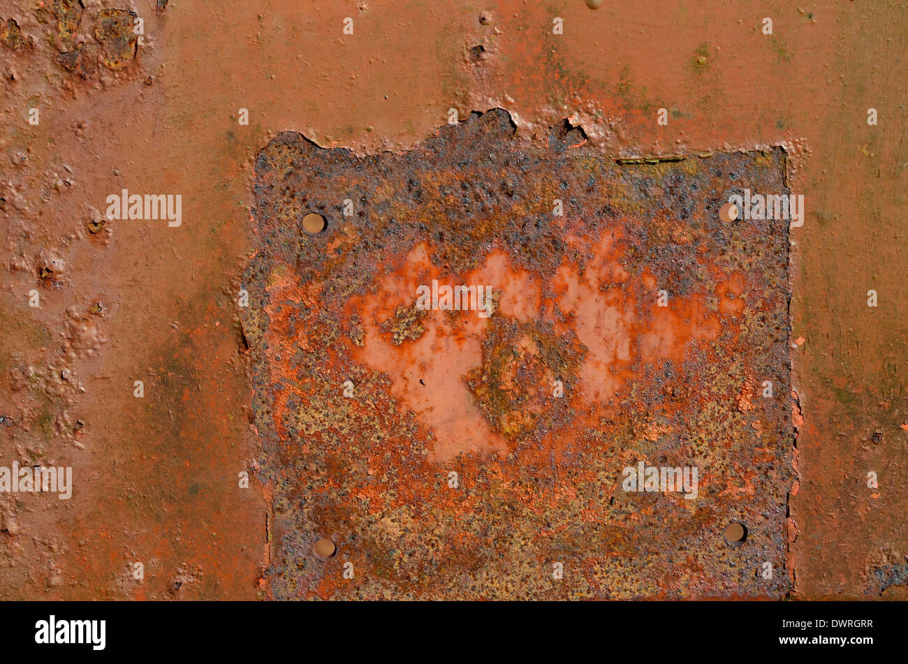 Close detail of rusting metalwork surface. Weathered metal texture, rusty metal texture. Stock Photo