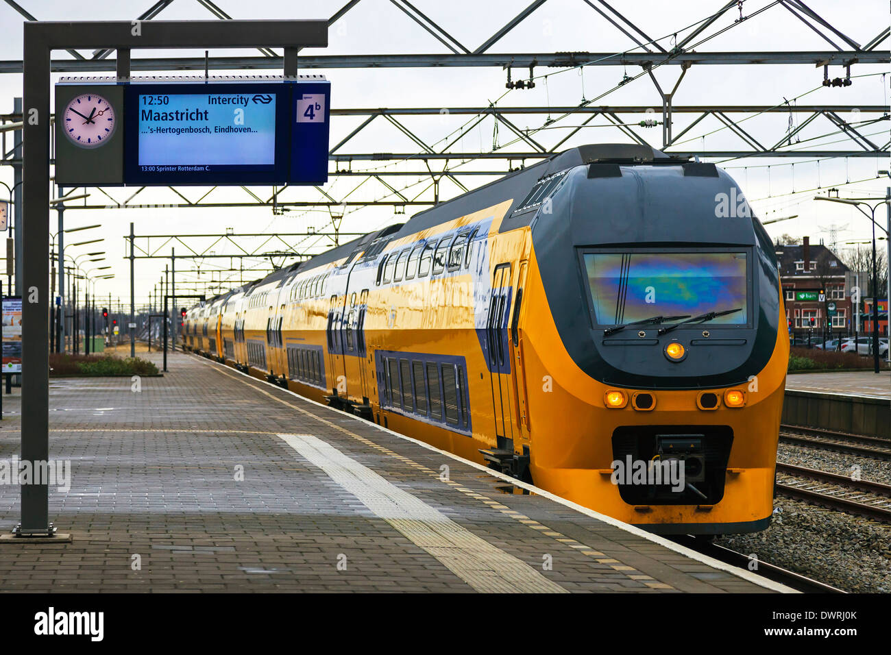Public transport train travelling to Maastricht, at Zandaam railway station, Amsterdam