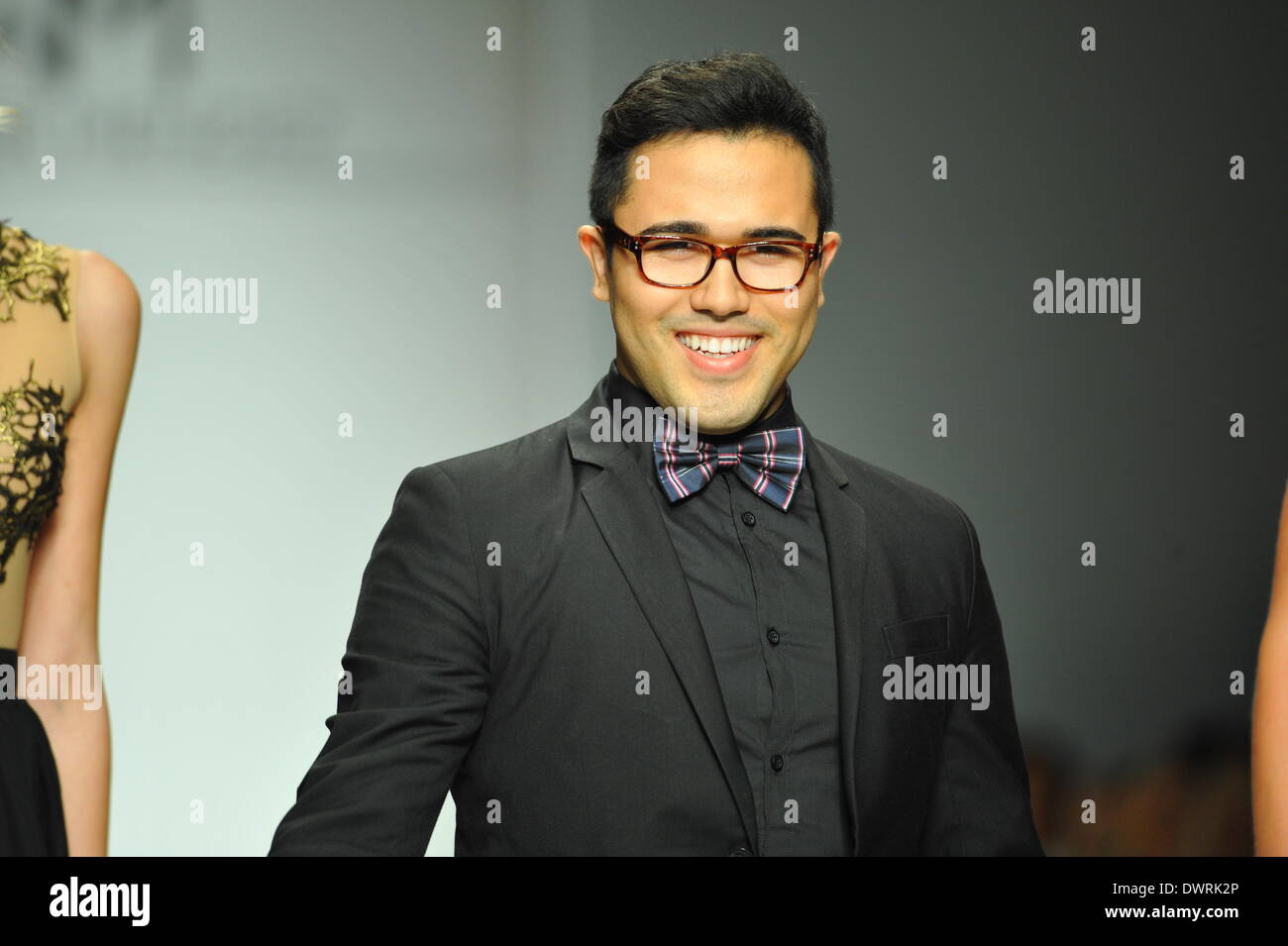 LOS ANGELES, CA - MARCH 10: Designer Walter Mendez and models walk