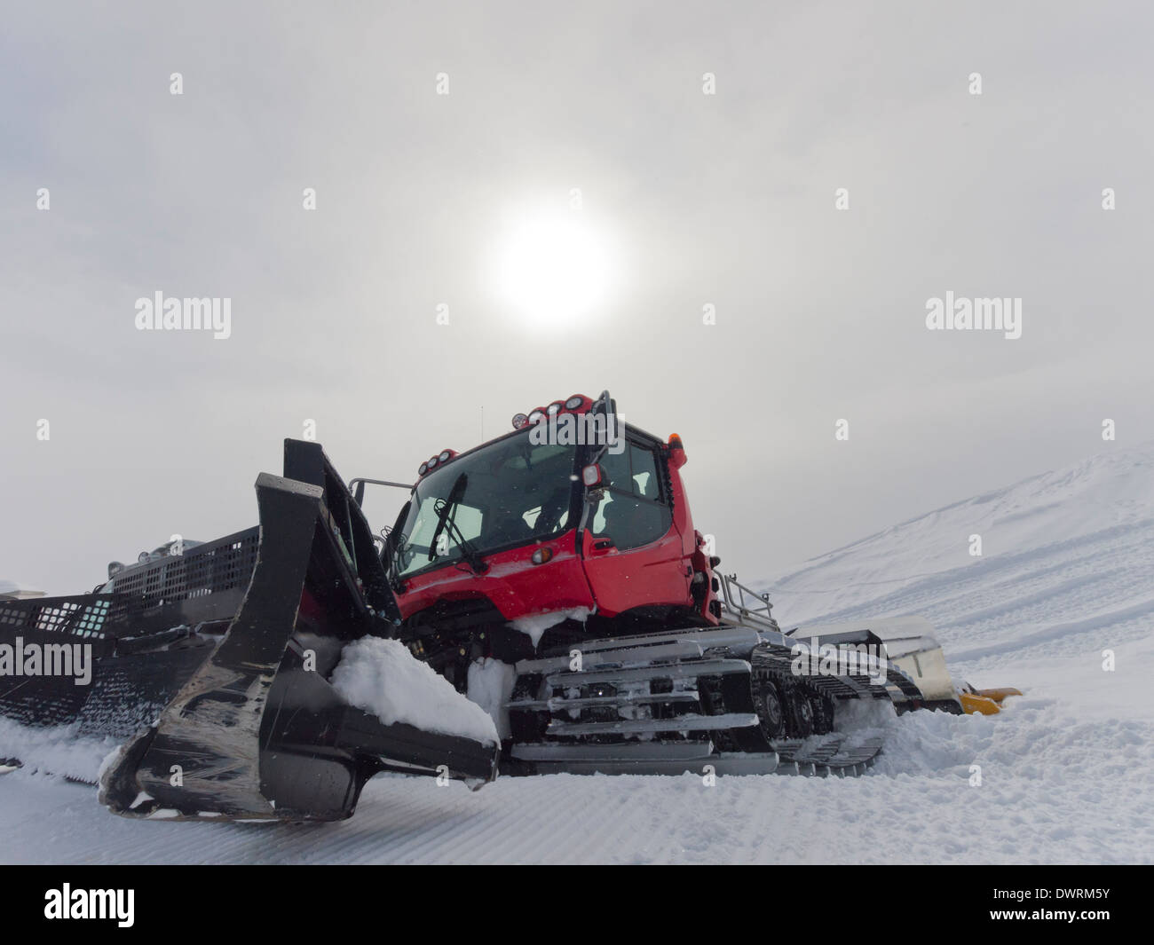 Snowcat for ski slope preparation in a Swiss ski resort. Stock Photo