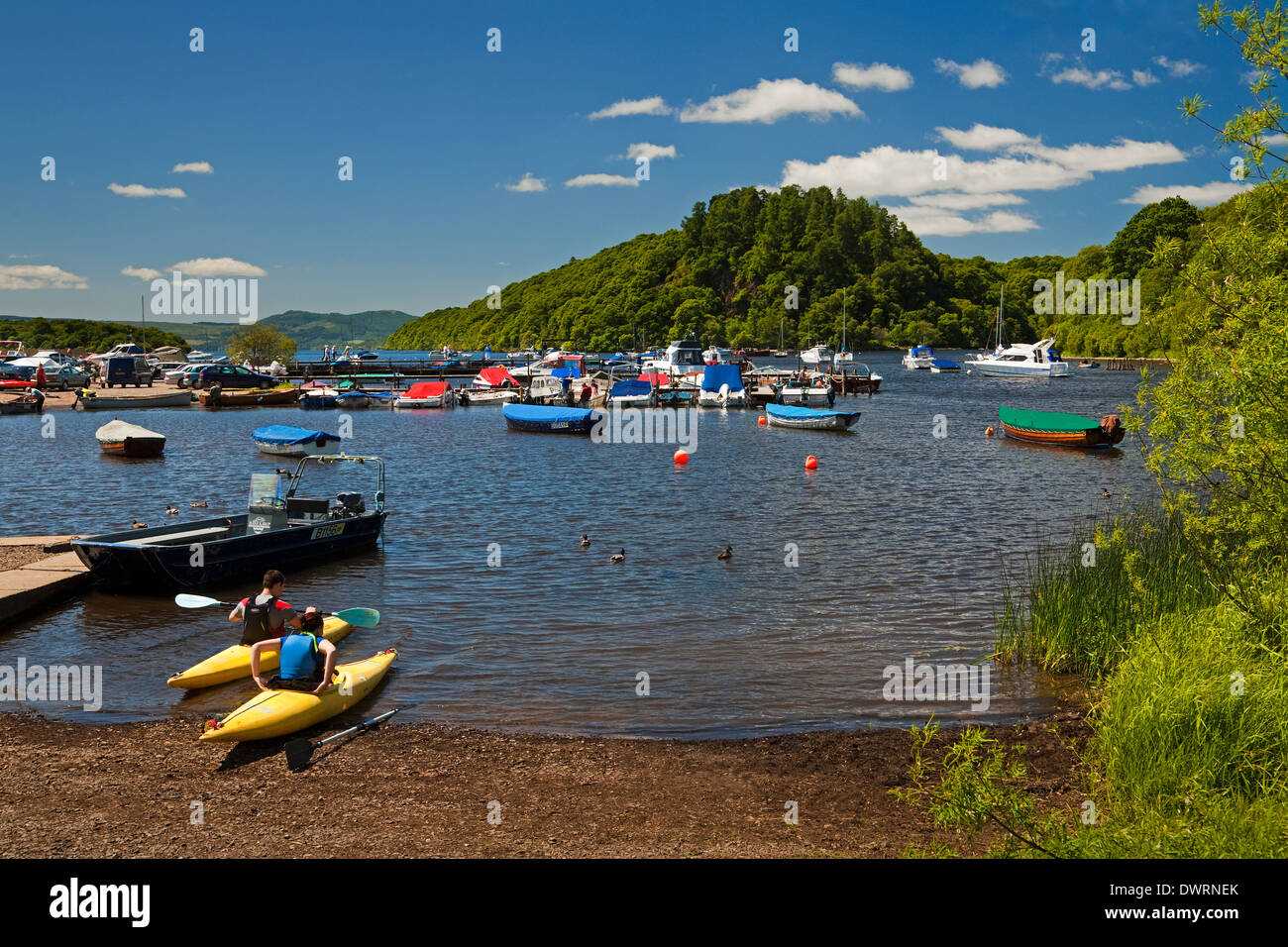 Kayaking at Balmaha Boatyard on Loch Lomond. Inchcailloch is in the