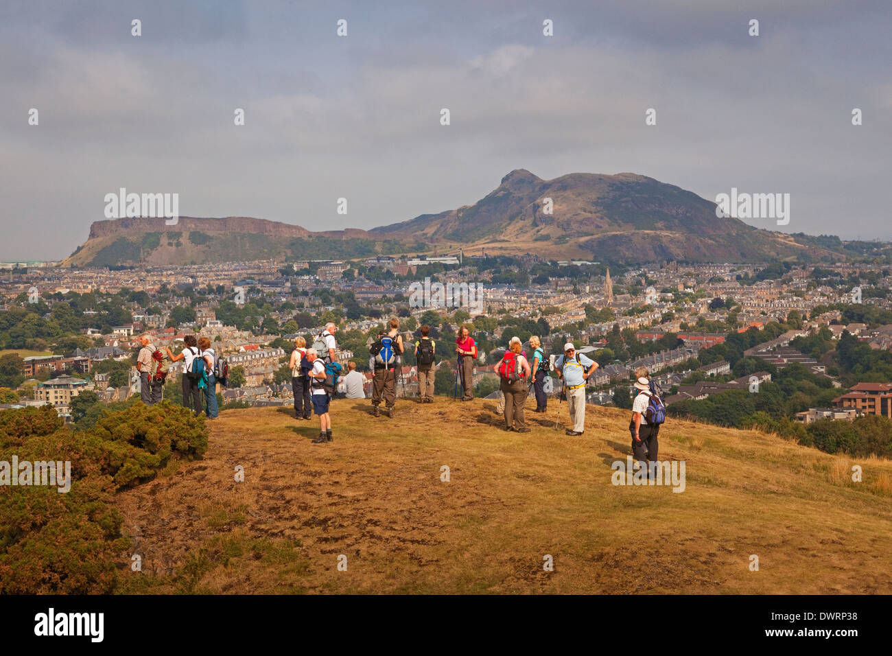Walkers on Blackford Hill, Edinburgh. Arthur's Seat is in the background. Stock Photo