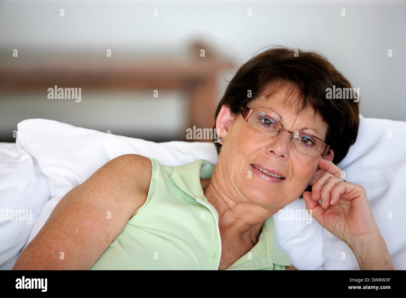 Propped pillows senior hires stock photography and images Alamy