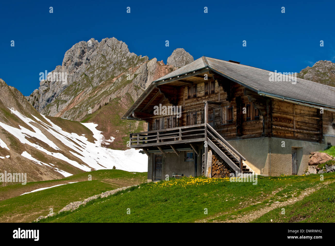 Alp cabin at the foot of the Dent de Ruth peak in the Gastlosen limestone mountain range, Abländschen, Switzerland Stock Photo