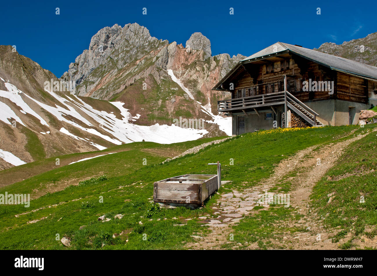 Alp cabin at the foot of the Dent de Ruth peak in the Gastlosen limestone mountain range, Abländschen, Switzerland Stock Photo