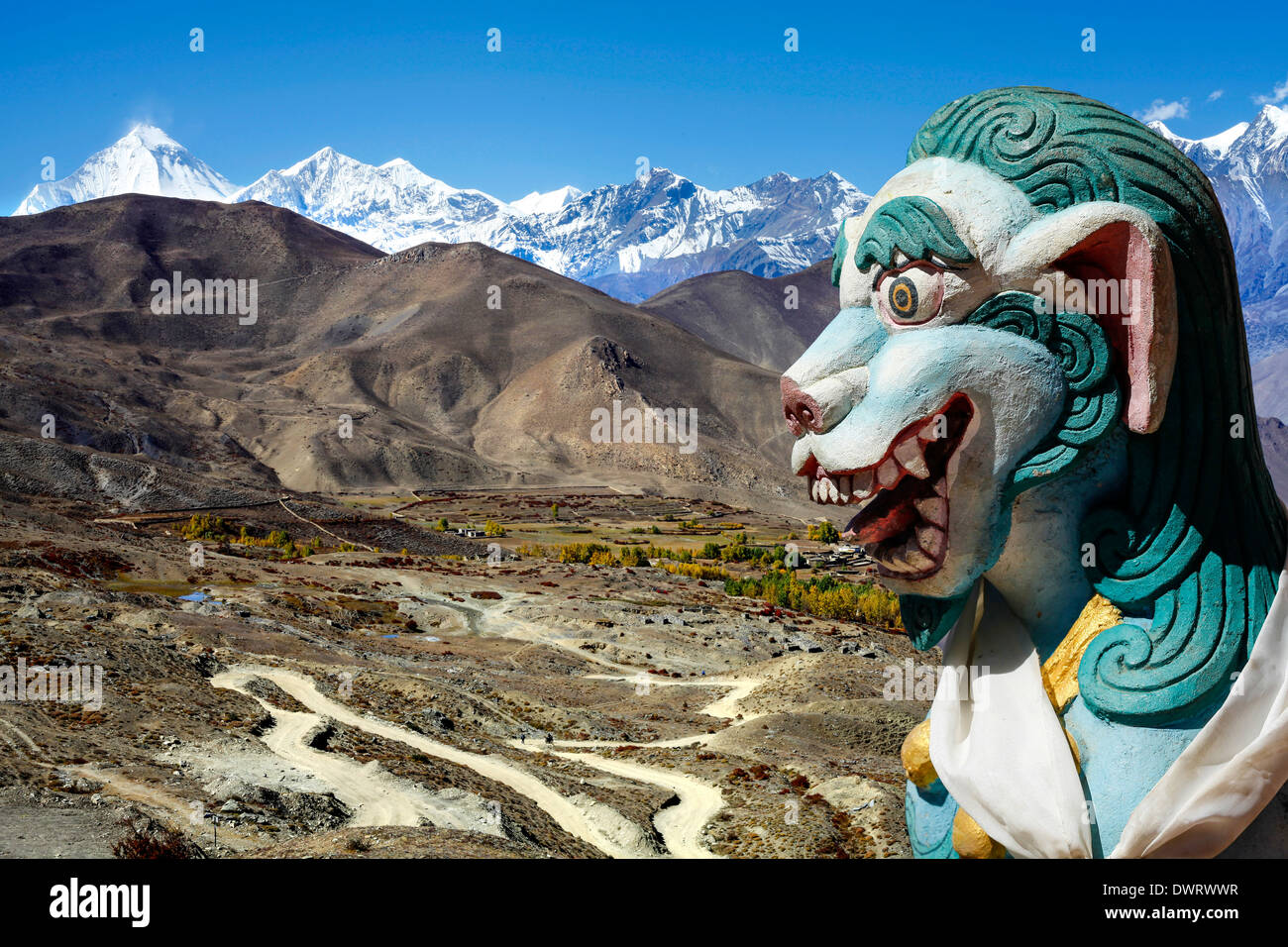 Ancient lion sculpture in Himalaya mountains in Nepal. Stock Photo