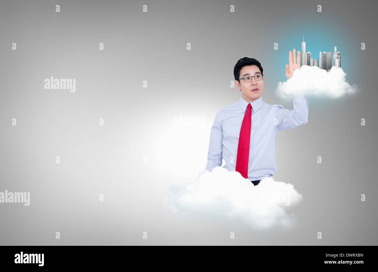 a businessman on a cloud Stock Photo - Alamy