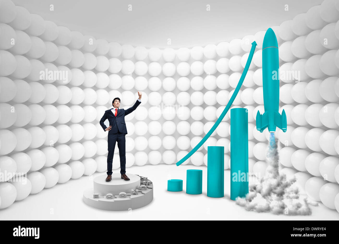 a businessman standing next to a rising graph Stock Photo - Alamy