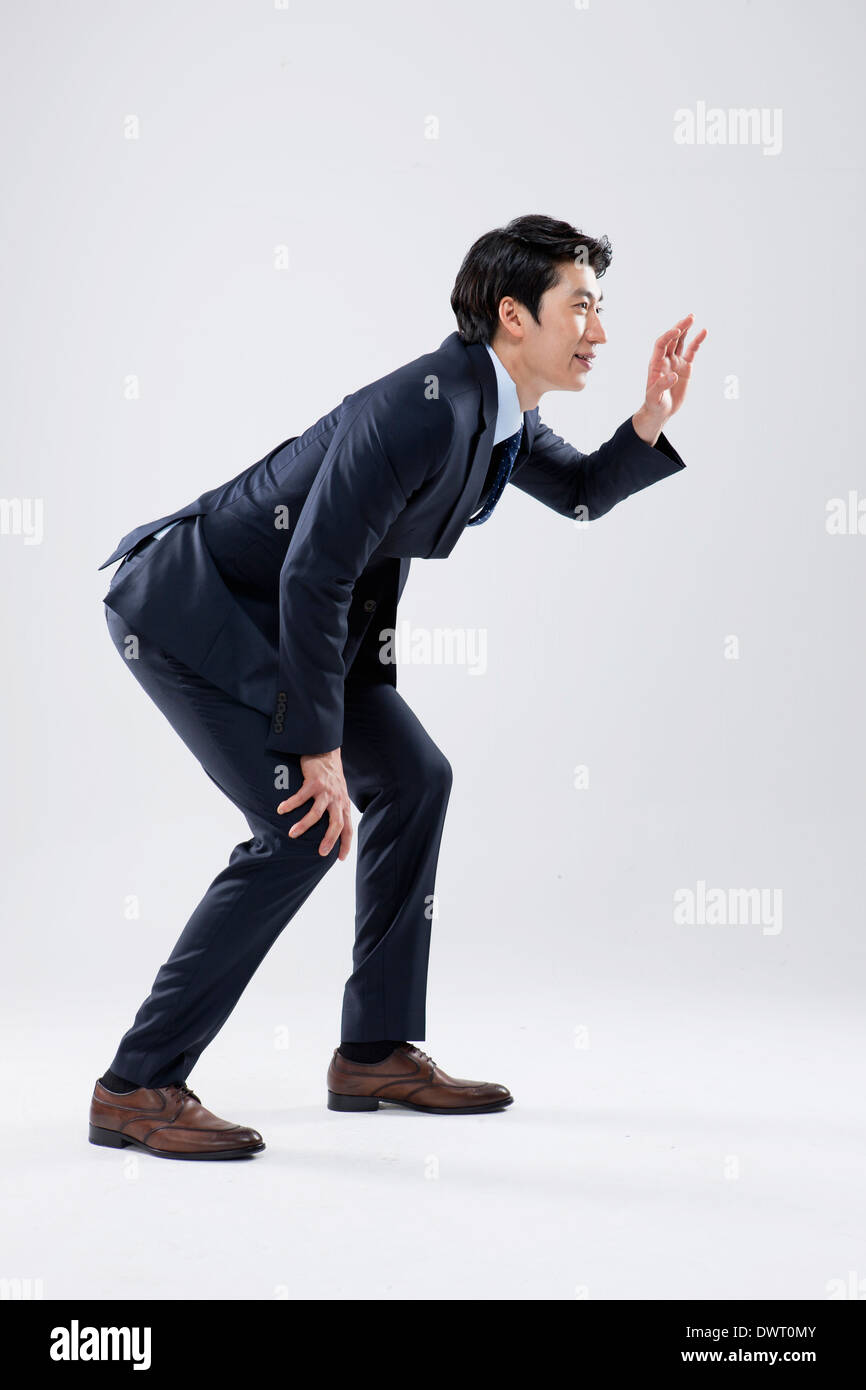 A Businessman Being Wary Of Something Stock Photo Alamy A Businessman Being Wary Of Something Stock Photo Alamy
