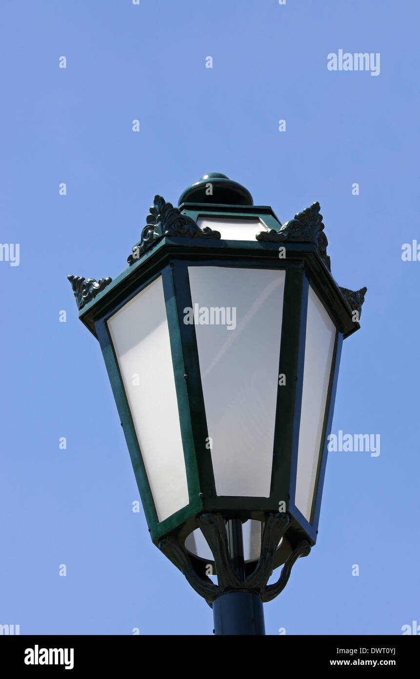 antique gas light on a blue sky background Stock Photo