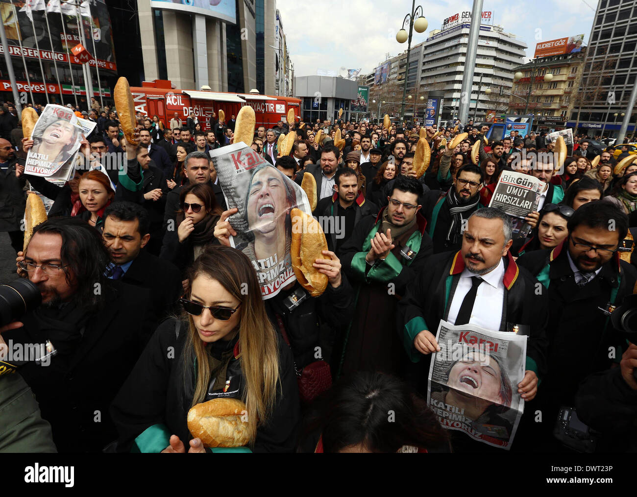 Istanbul, Turkey. 12th Mar, 2014. People demostrate in a street of Ankara, Turkey, March 12, 2014. Tension was getting high in Turkey's city of Istanbul on Wednesday as 50,000 people were flocking to a funeral of a 15-year-old student who died Tuesday after 269 days in coma. The death of Berkin Elvan has triggered a nationwide anti-government protests in more than 30 cities in Turkey. Elvan was sent into a coma after sustaining a head injury from a gas canister as he went to buy bread during a police crackdown in Istanbul last June. Credit:  Cihan/Xinhua/Alamy Live News Stock Photo