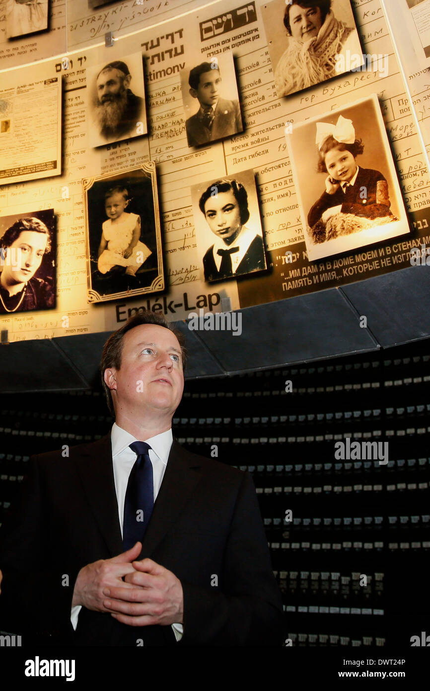 Jerusalem, Israel. 12th Mar, 2014. Visiting British Prime Minister David Cameron visits the Yad Vashem Holocaust Memorial museum in Jerusalem, on March 12, 2014. British Prime Minister David Cameron on Wednesday called on the Israeli Knesset (parliament) to reach out for historic peace with Palestinians, during his first visit to Israel as prime minister. British Prime Minister David Cameron is on a two-day visit to Israel and Palestinian territories. Credit: POOL/Gali Tibbon/Xinhua/Alamy Live News Stock Photo