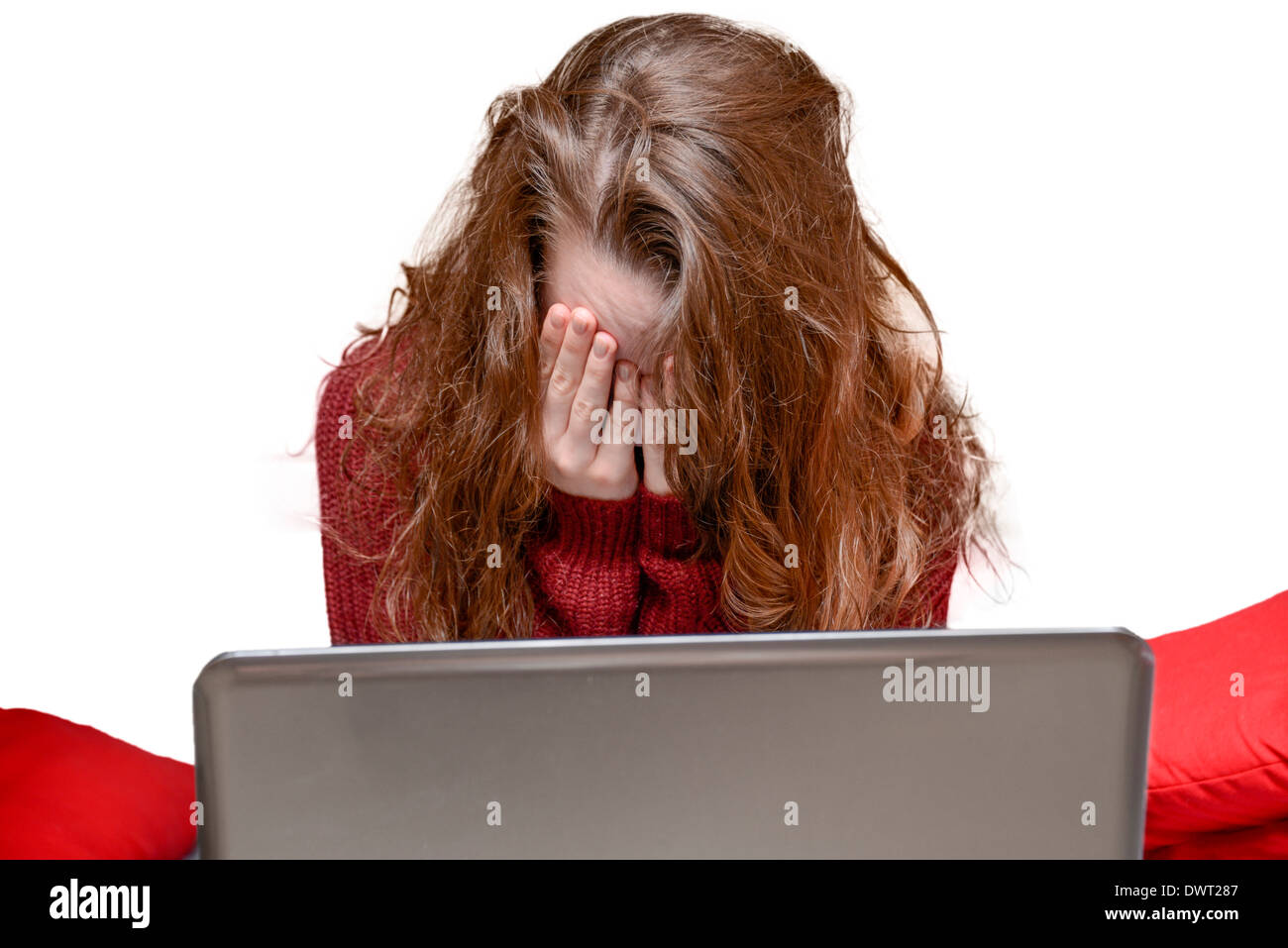 Teenager at a computer Stock Photo