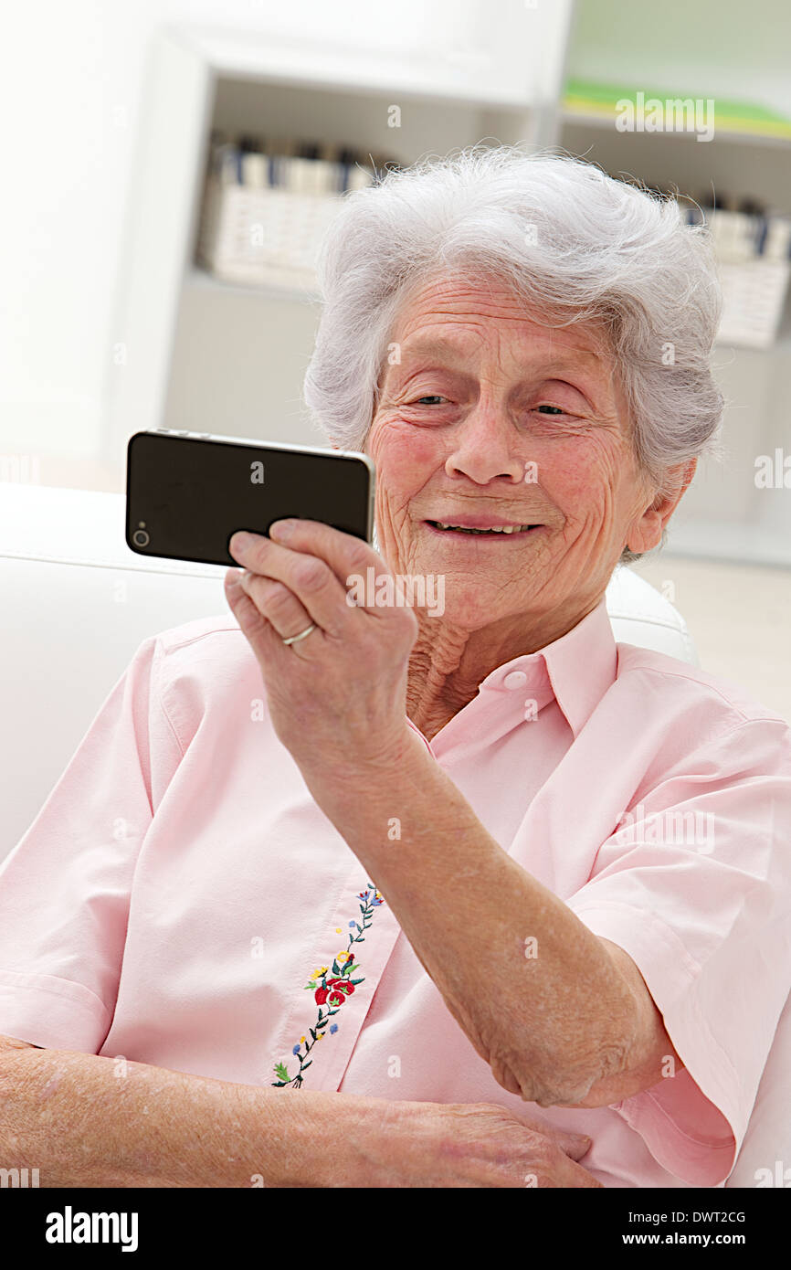 Elderly person on the phone Stock Photo Alamy