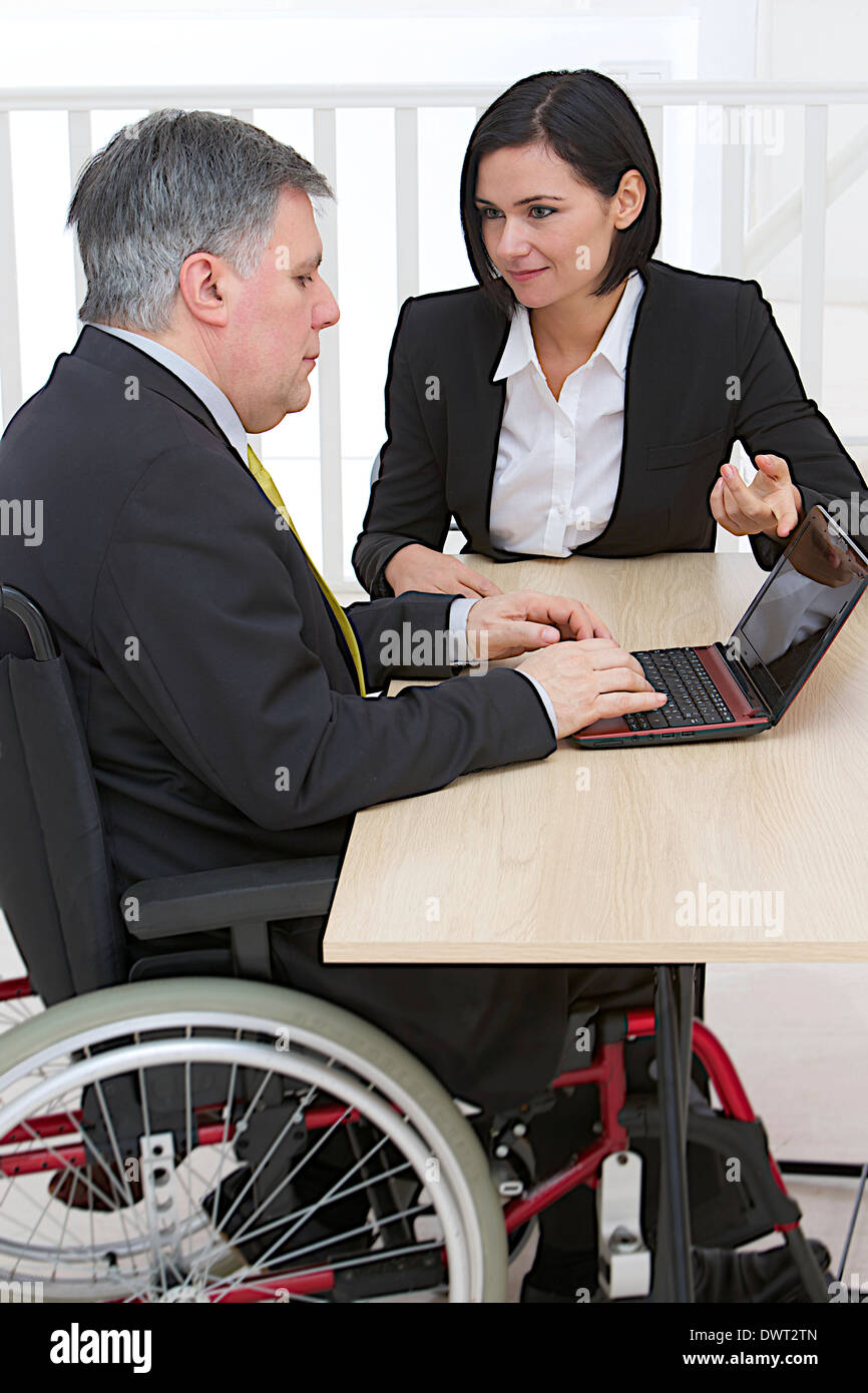 Handicapped person working Stock Photo