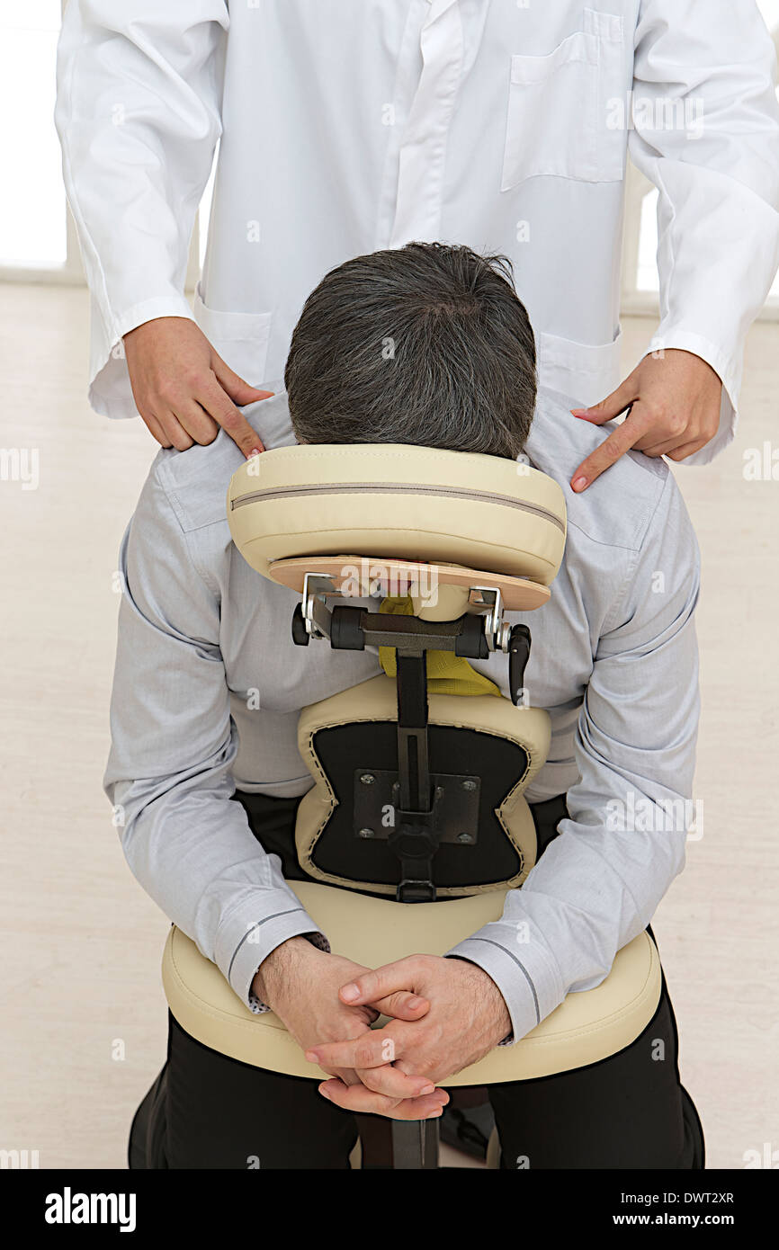 Seated massage hires stock photography and images Alamy