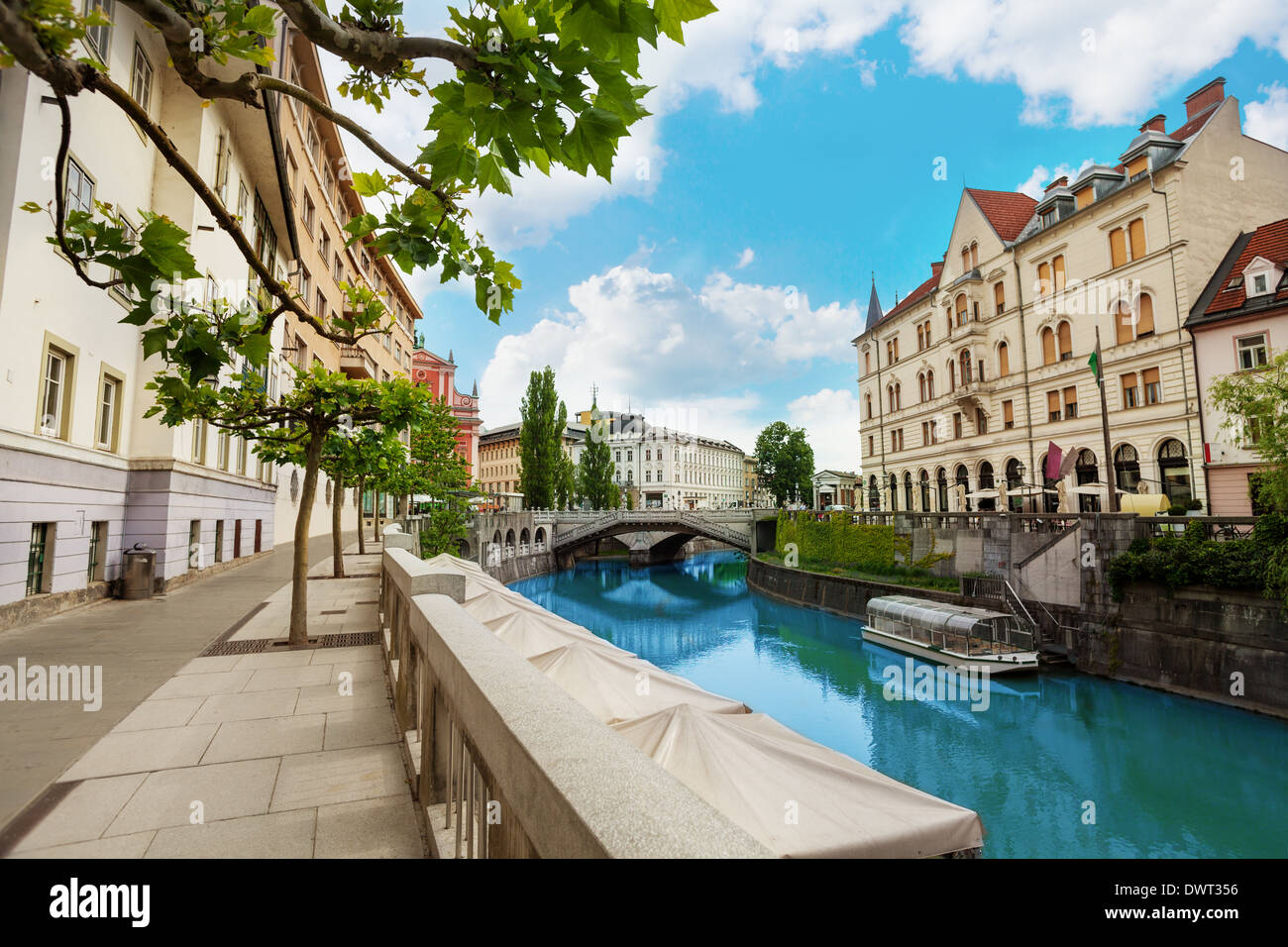 Ljubljana river embankment in downtown on central street Stock Photo